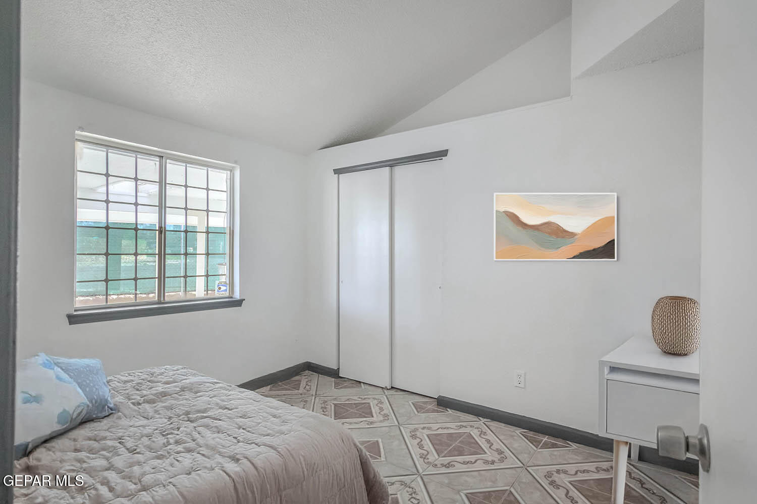 859 Destello Road El Paso, TX 79907 - Photo 26 of 43 a bedroom with a bed and window