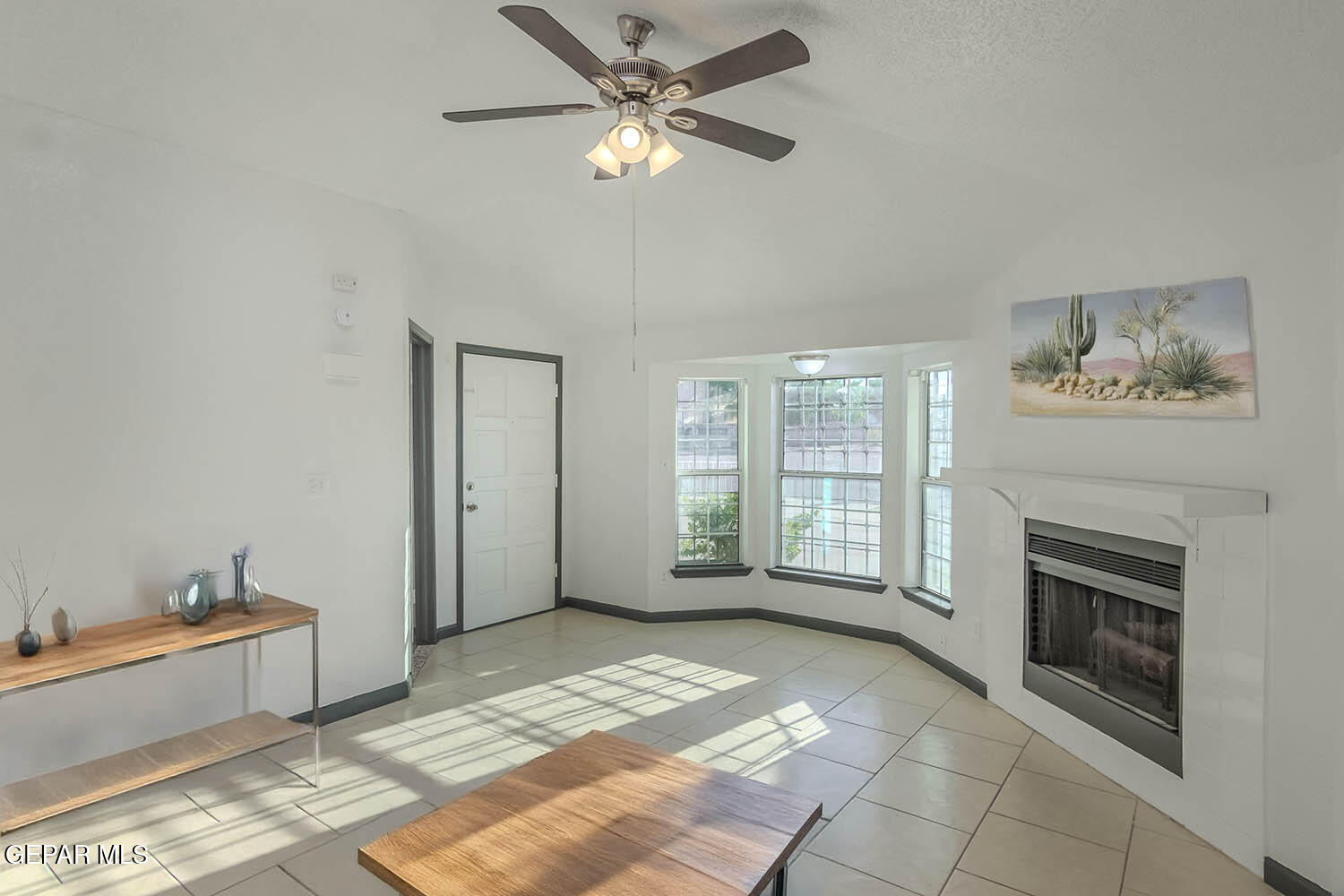 859 Destello Road El Paso, TX 79907 - Photo 3 of 43 a view of livingroom with furniture chandelier fan and fire place