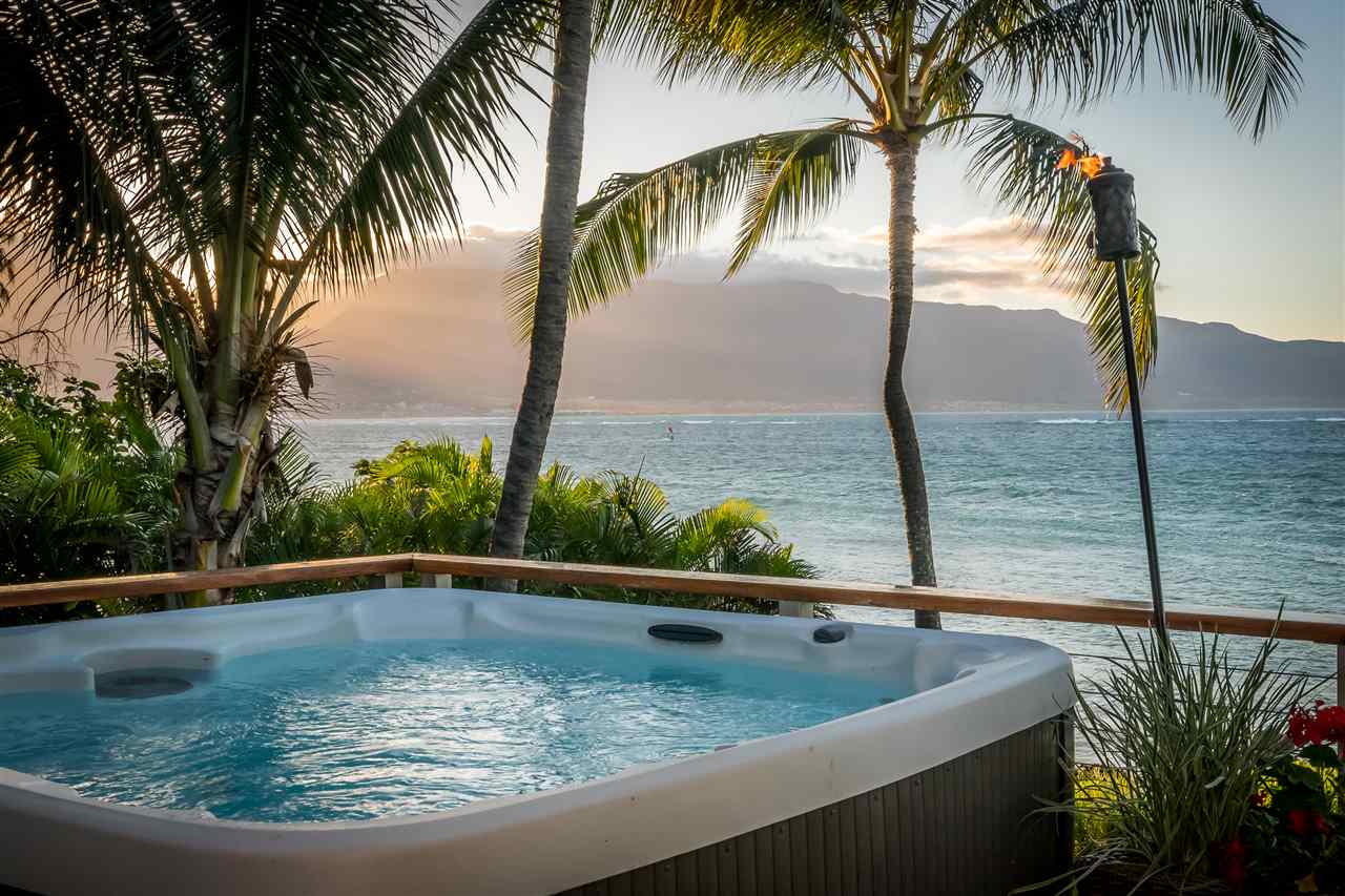 602 Stable Road Paia, HI 96779 - Photo 26 of 30 a view of a swimming pool with a lake view