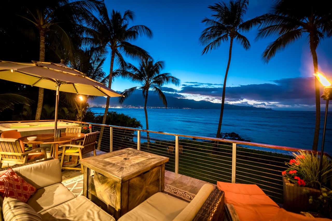 602 Stable Road Paia, HI 96779 - Photo 28 of 30 a terrace with outdoor seating and trees