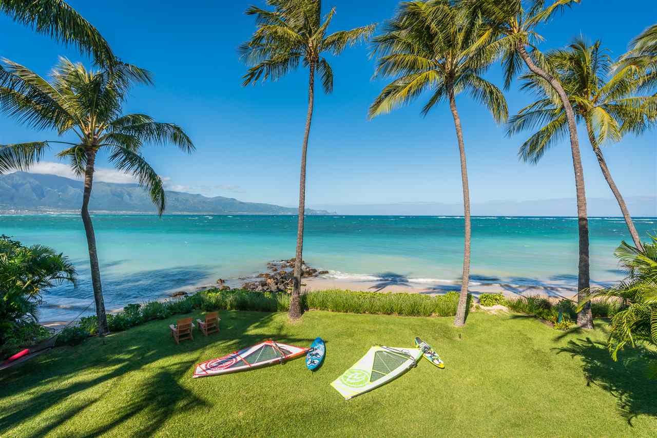 602 Stable Road Paia, HI 96779 - Photo 6 of 30 a view of a swimming pool with a garden