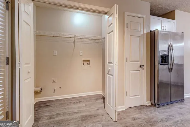 a view of a room with racks on the wall