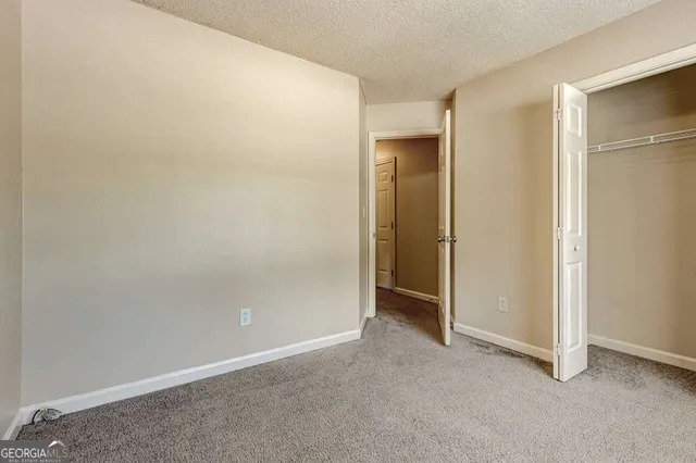 a view of a room with an empty space