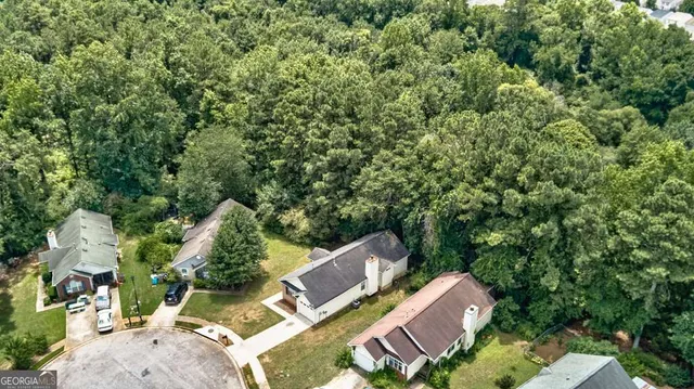 an aerial view of a city with lots of residential buildings