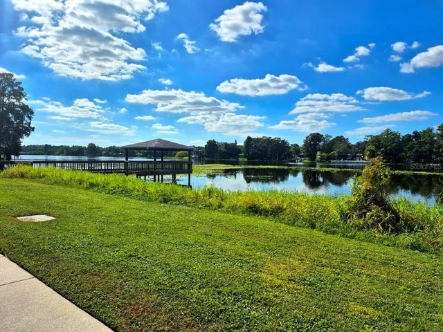 a view of a lake with a big yard