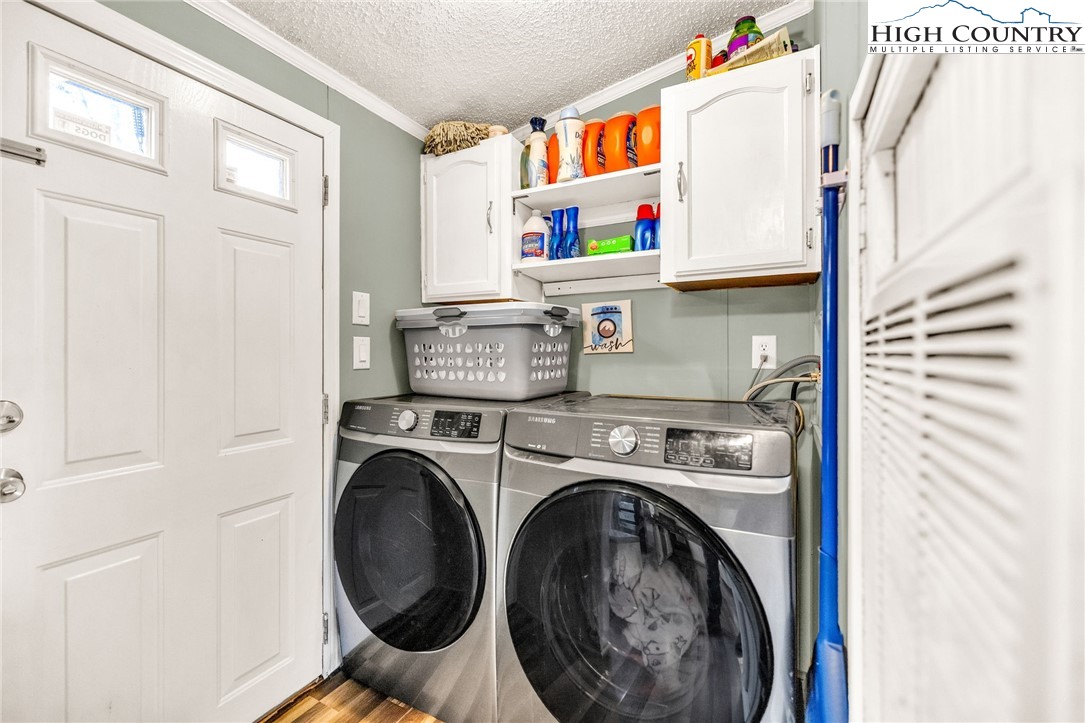 747 Nathans Creek School Road Crumpler, NC 28617 - Photo 29 of 42 a utility room with dryer and washer