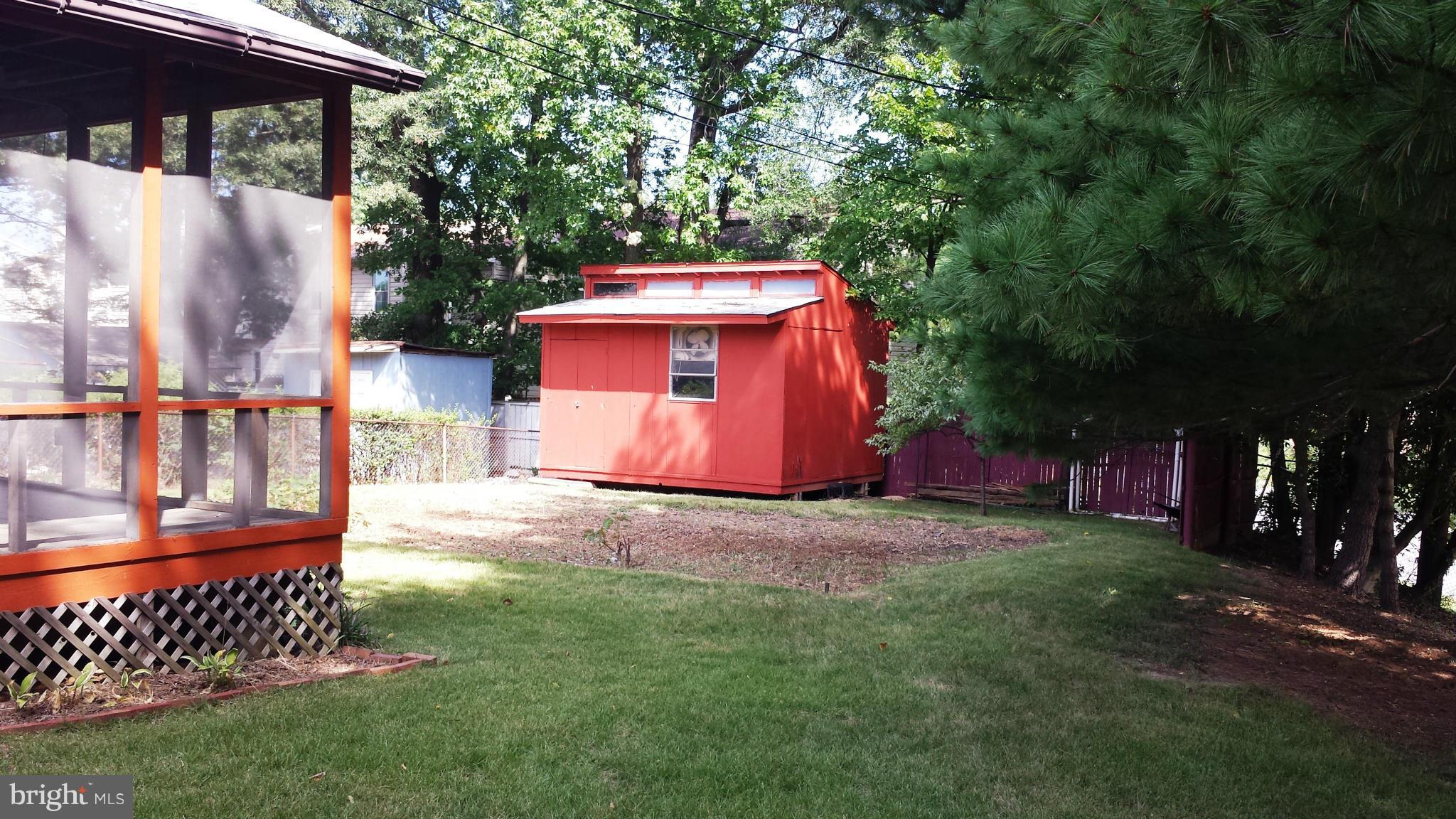 6509 Livingston Road Oxon Hill, MD 20745 - Photo 3 of 30 Backyard with Screened Porch & Shed