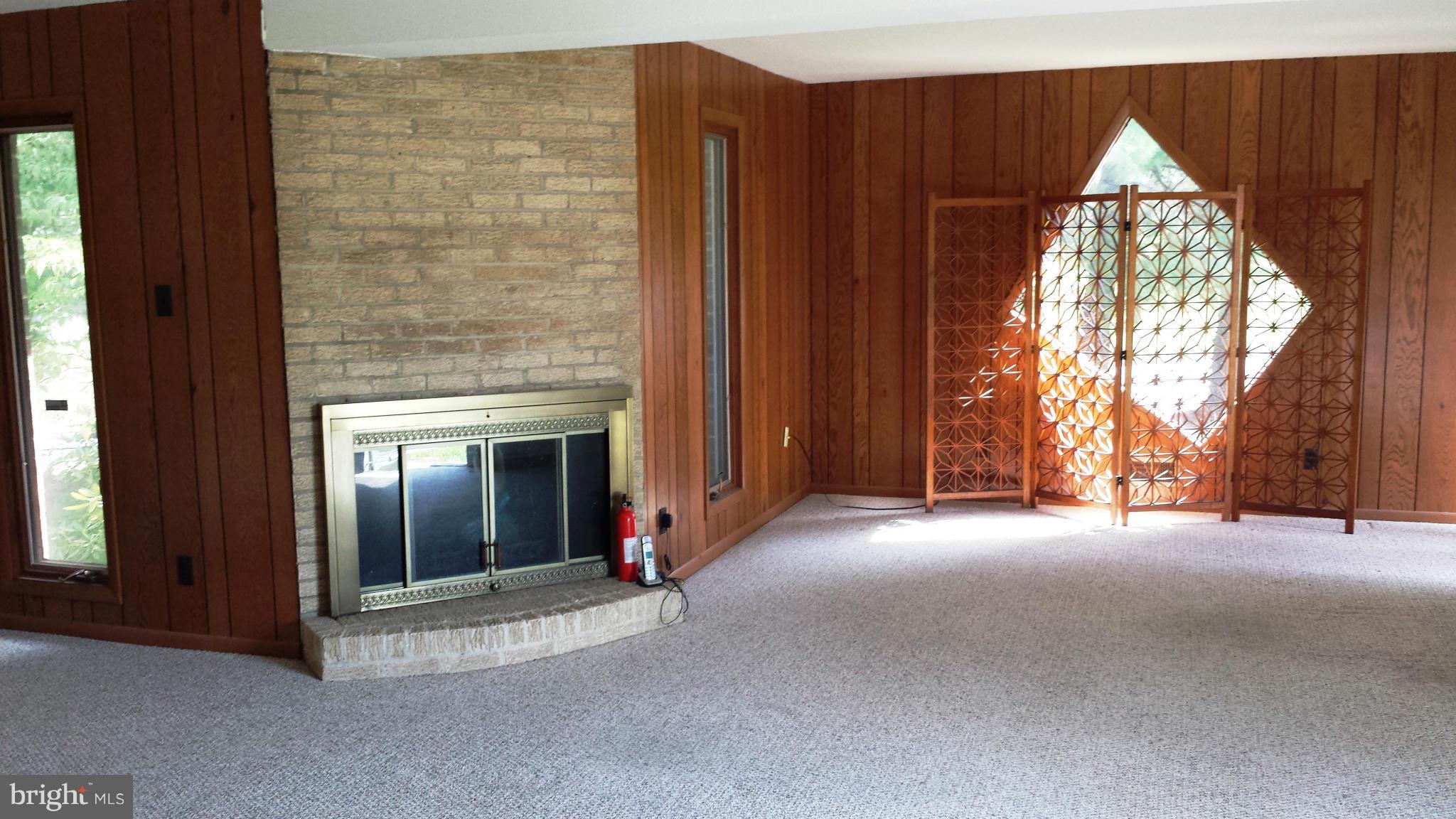 6509 Livingston Road Oxon Hill, MD 20745 - Photo 4 of 30 Living Room with Wood Burning Fireplace