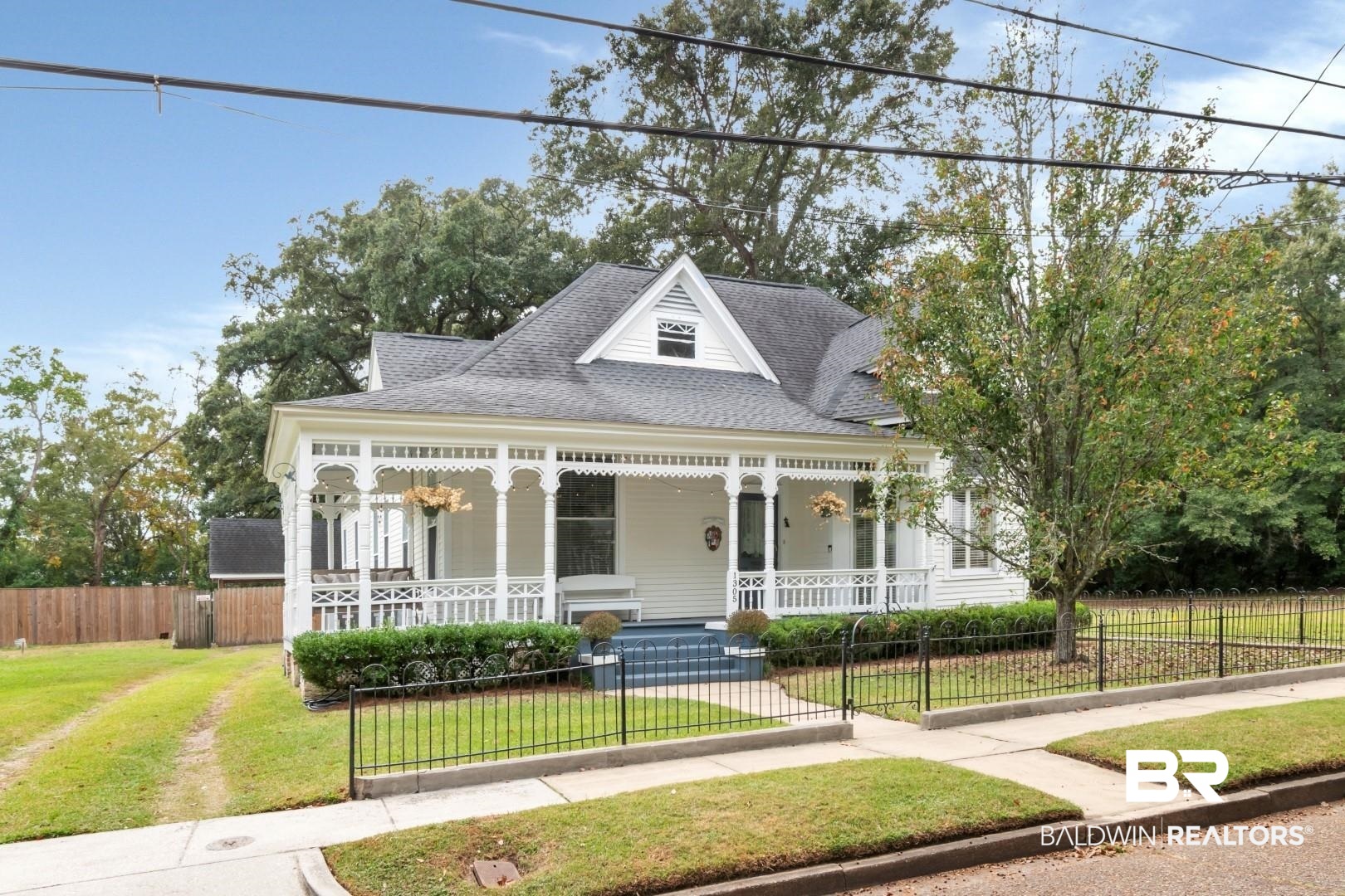 1305 Brown Street Mobile, AL 36604 - Photo 34 of 37 View of front facade with covered porch and a front lawn