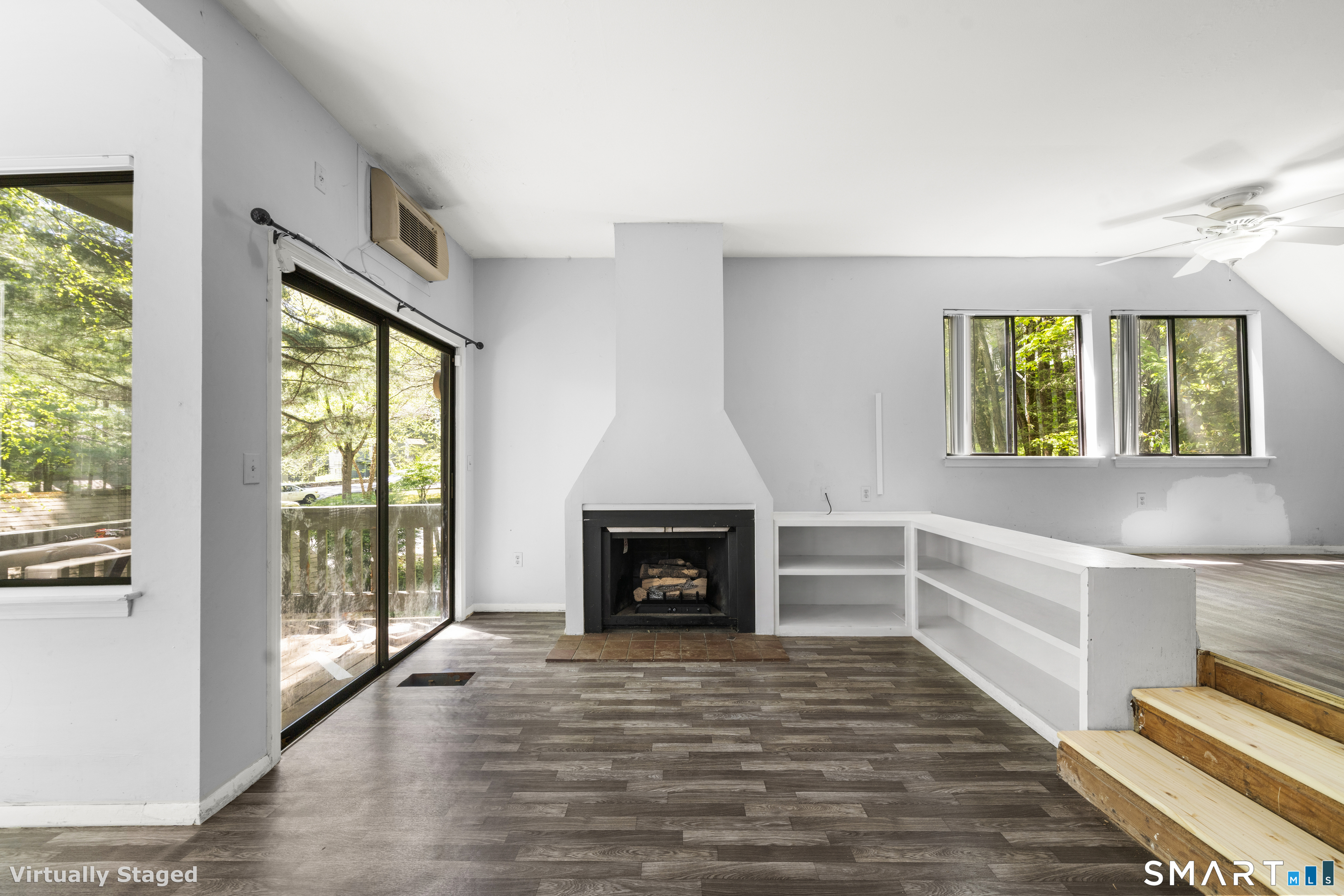 39 Evergreen Road, Unit 39 Torrington, CT 06790 - Photo 26 of 27 a view of an empty room with window and fire place