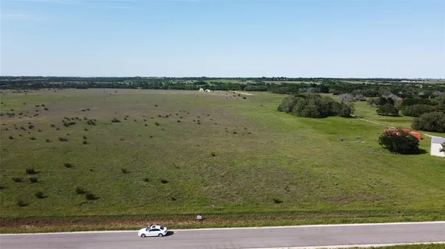 a view of a lake with outdoor space