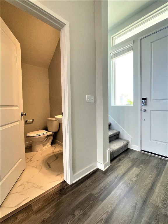15110 Forum Avenue Pflugerville, TX 78660 - Photo 10 of 29 a view of a bedroom with wooden floor and bathroom
