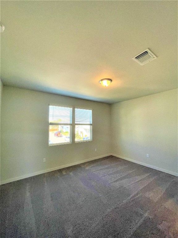 15110 Forum Avenue Pflugerville, TX 78660 - Photo 14 of 29 an empty room with a empty space and windows