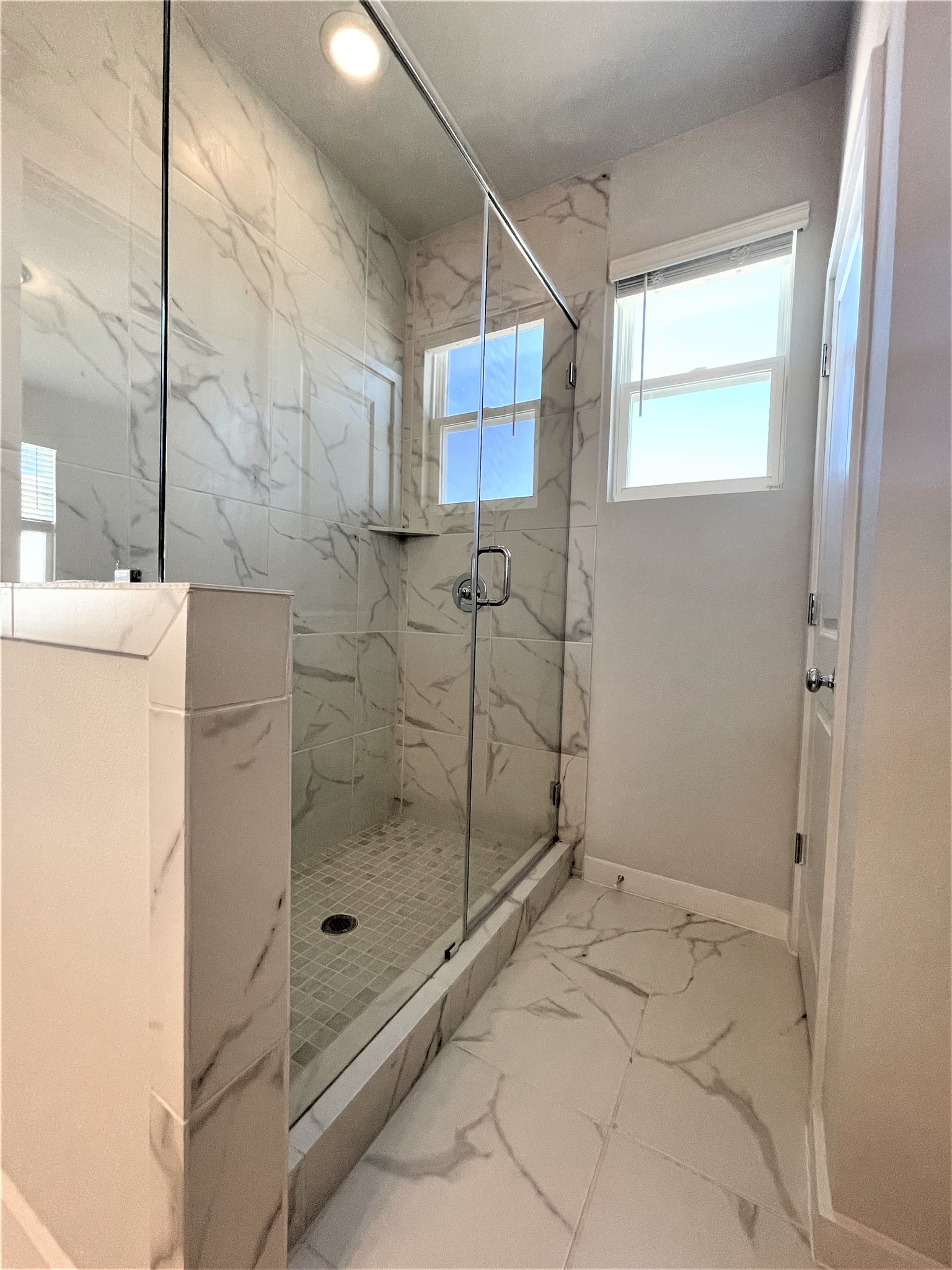 15110 Forum Avenue Pflugerville, TX 78660 - Photo 18 of 29 a bathroom with a shower and a sink