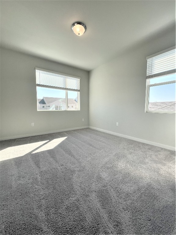 15110 Forum Avenue Pflugerville, TX 78660 - Photo 23 of 29 an empty room with a empty space and windows