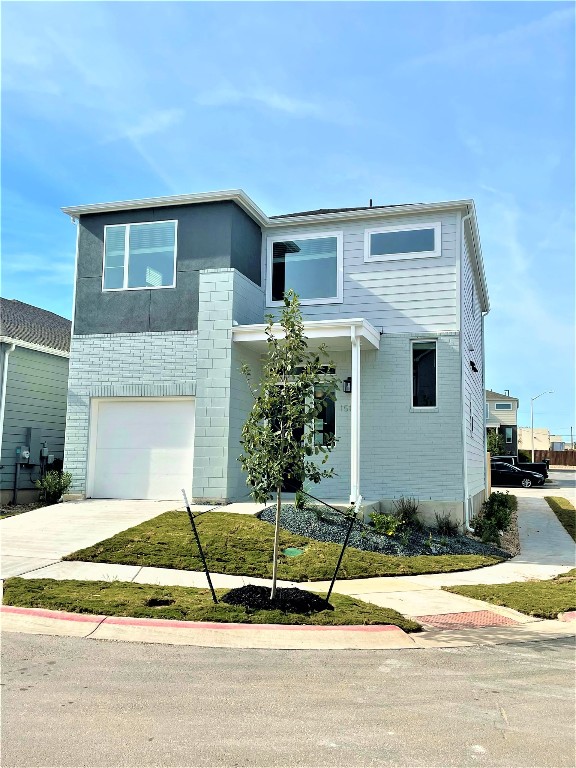 15110 Forum Avenue Pflugerville, TX 78660 - Photo 3 of 29 a house that has a tree in front of it