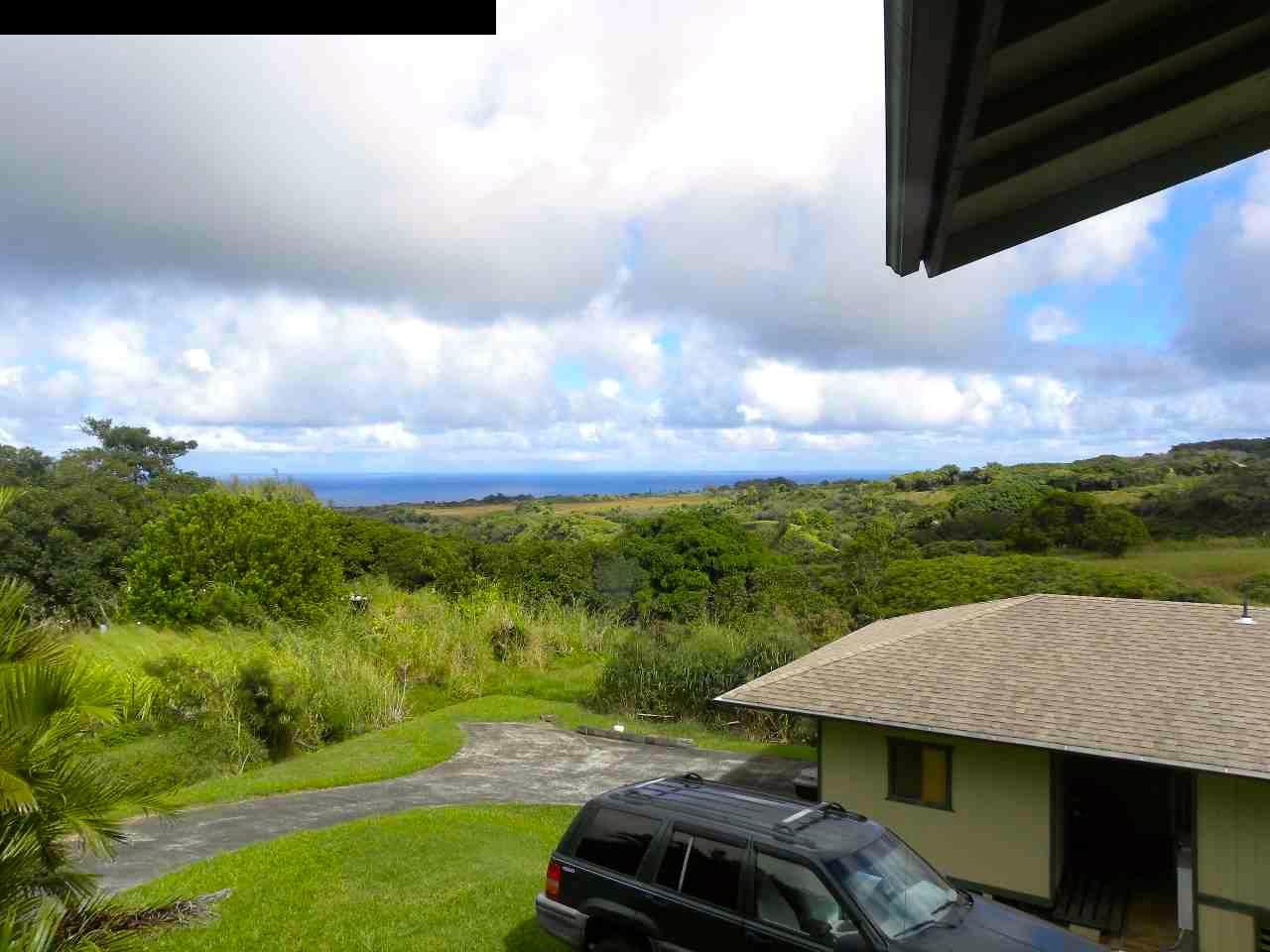 305 Kaupakalua Road Haiku, HI 96708 - Photo 5 of 13 a view of a yard with an outdoor seating
