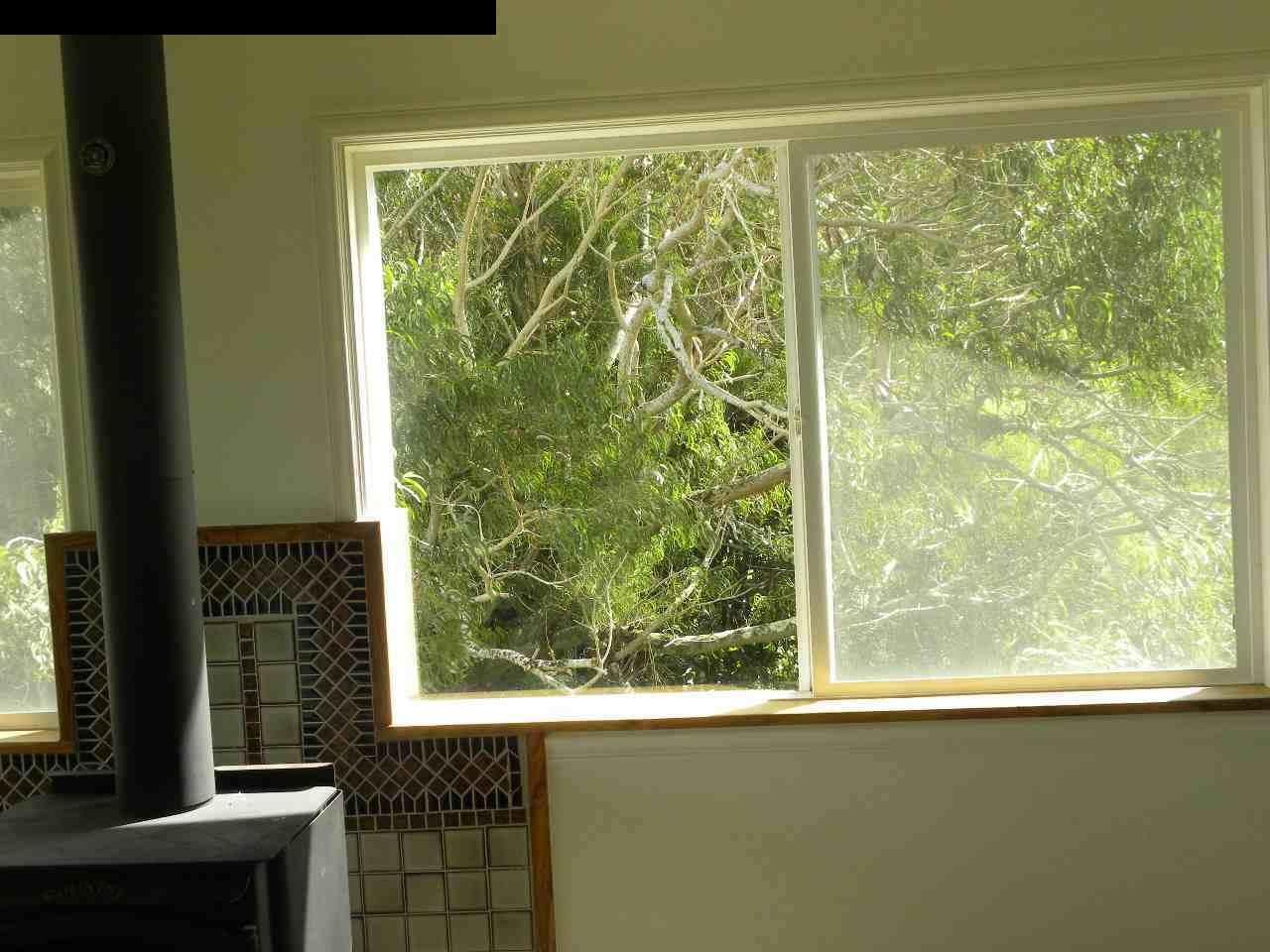 305 Kaupakalua Road Haiku, HI 96708 - Photo 10 of 13 a view of a room that has a large window and front view