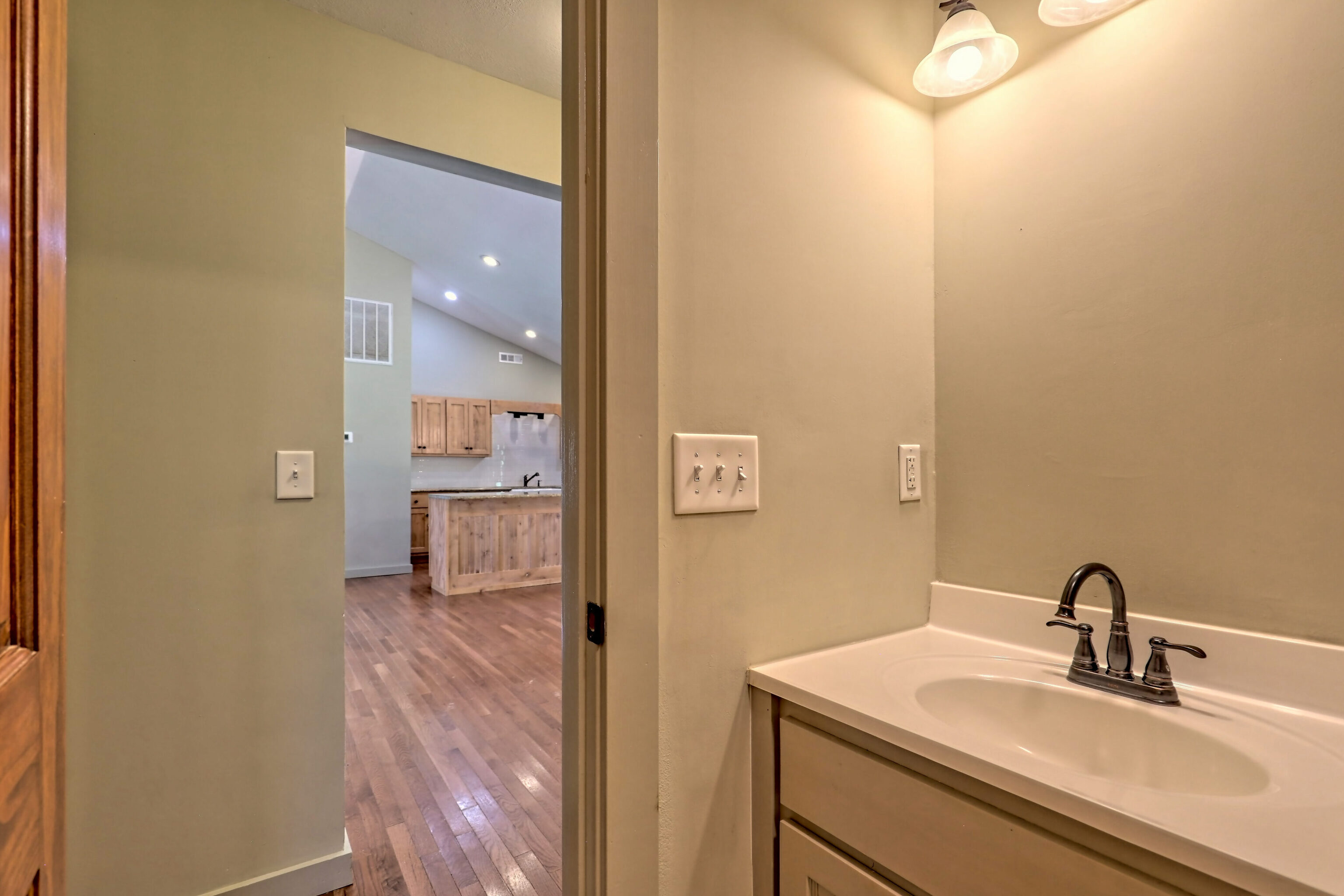 3622 Sandy Ford Road Clayton, GA 30525 - Photo 147 of 182 a bathroom with a sink a mirror and a shower