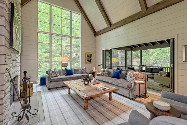 a bathroom with a granite countertop sink double vanity and a mirror