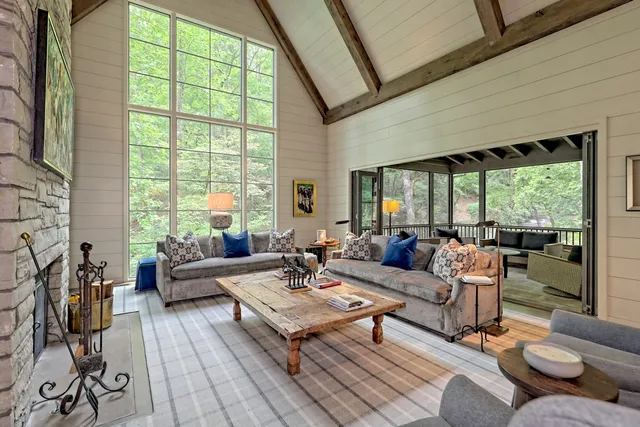 a bathroom with a granite countertop sink double vanity and a mirror