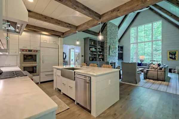 a bathroom with a toilet a sink and a bathtub