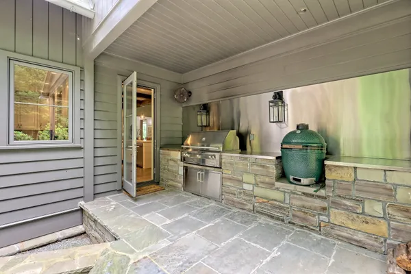 a view of a swimming pool with a lake view