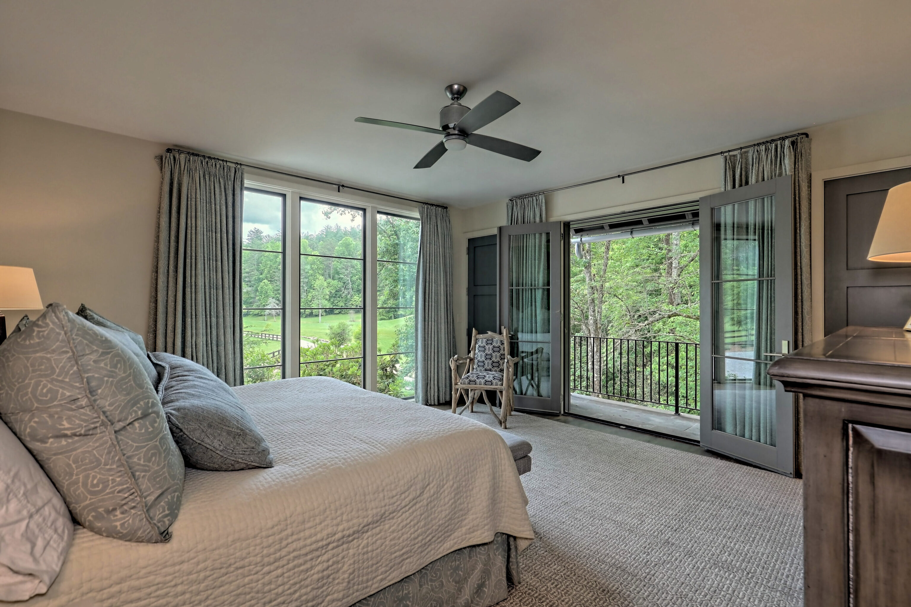 3622 Sandy Ford Road Clayton, GA 30525 - Photo 52 of 182 a bedroom with a bed and a large window