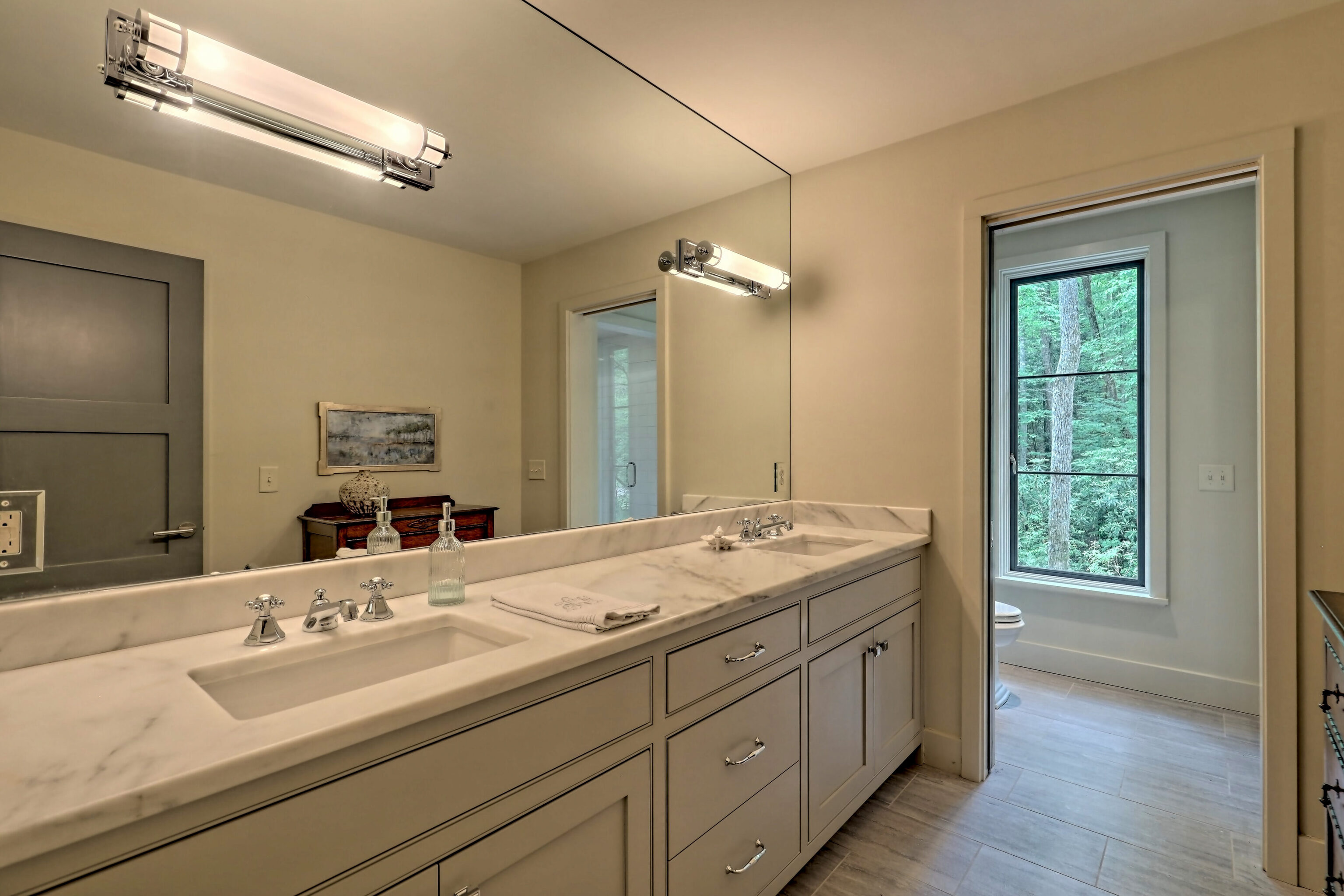 3622 Sandy Ford Road Clayton, GA 30525 - Photo 81 of 182 a bathroom with a granite countertop sink double vanity and a mirror