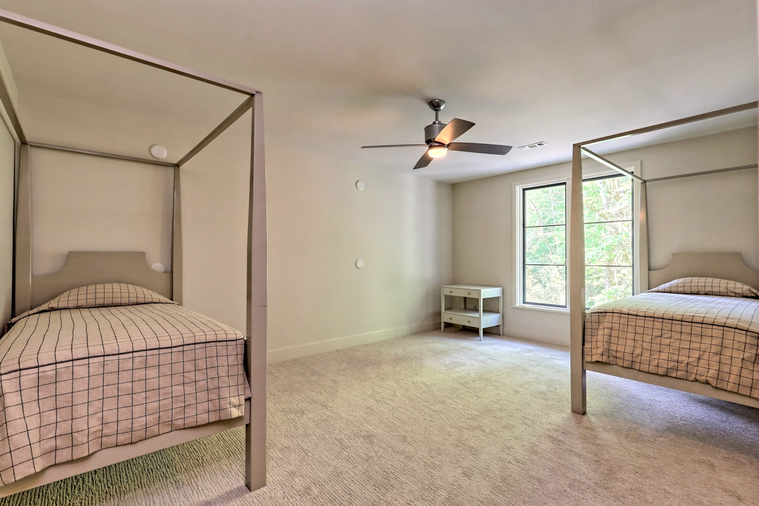 3622 Sandy Ford Road Clayton, GA 30525 - Photo 83 of 182 a bedroom with a bed and a lamp
