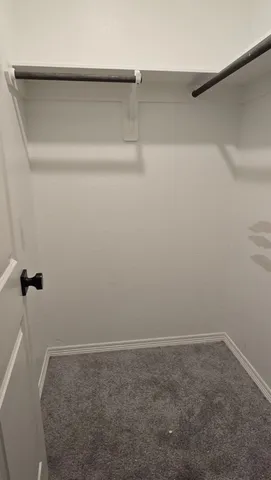 a view of a room with racks on the wall