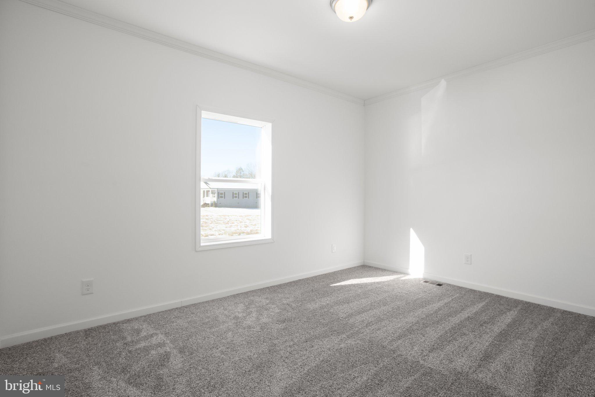 1005 Levi Road Green Bay, VA 23942 - Photo 22 of 34 an empty room with a window