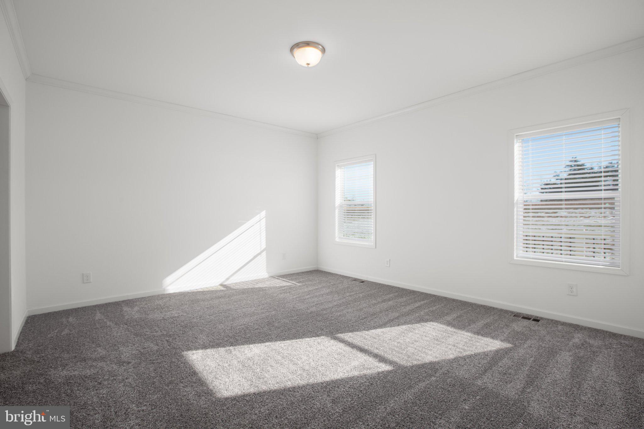 1005 Levi Road Green Bay, VA 23942 - Photo 27 of 34 an empty room with windows