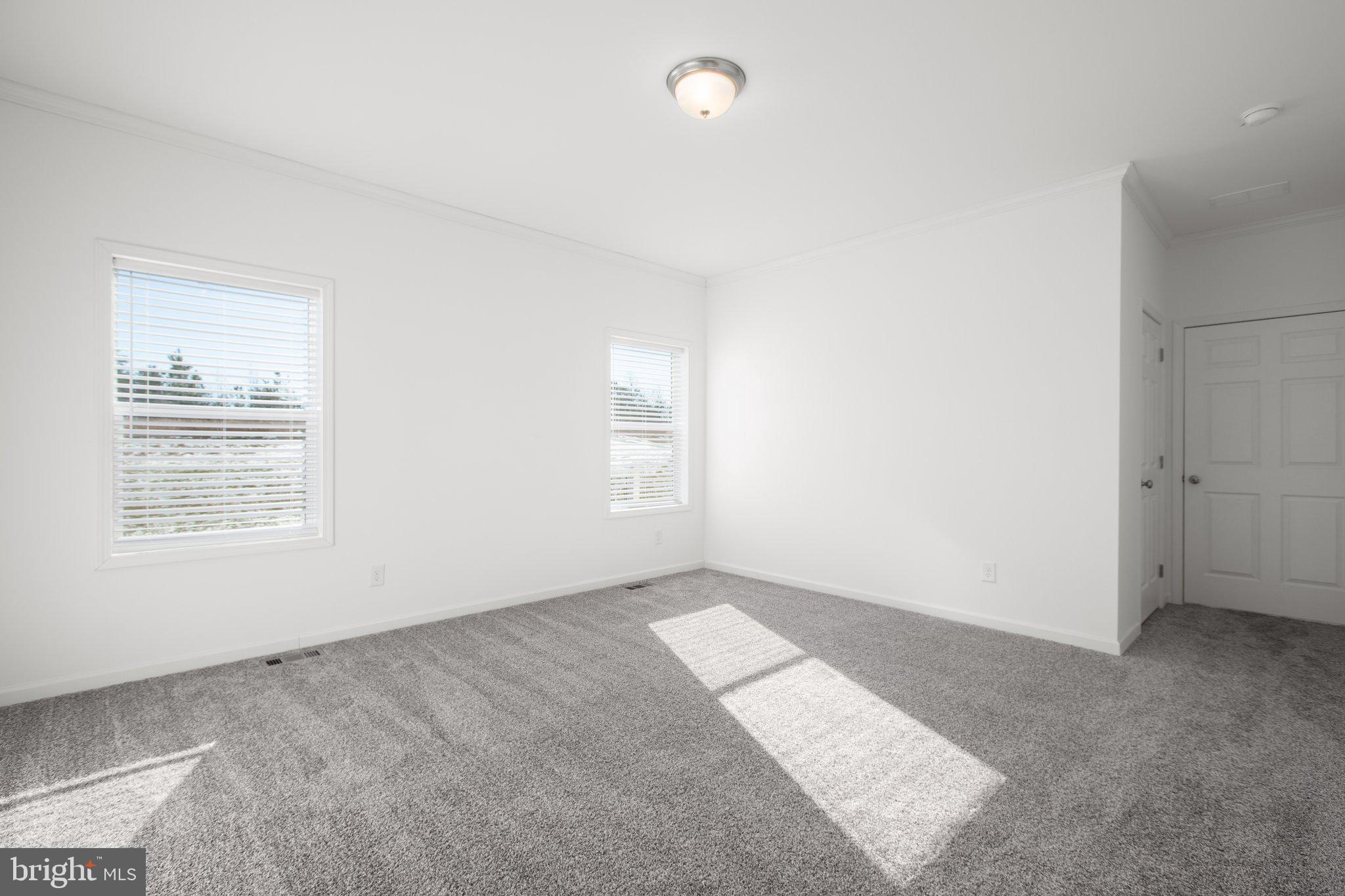 1005 Levi Road Green Bay, VA 23942 - Photo 28 of 34 an empty room with windows