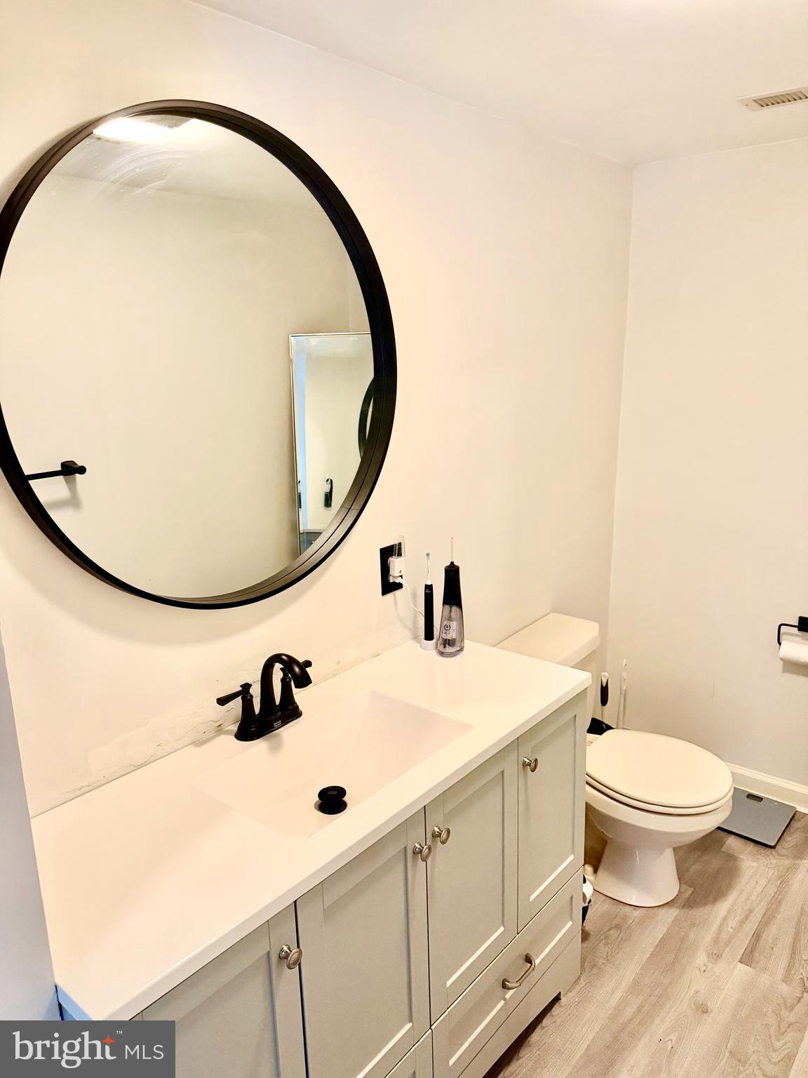 280 Progress Street Riverside, NJ 08075 - Photo 15 of 20 a bathroom with a sink and a mirror