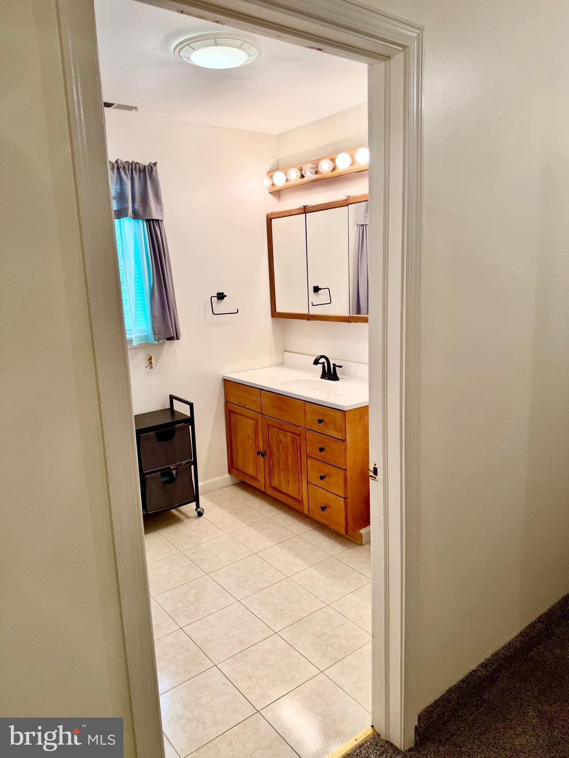 280 Progress Street Riverside, NJ 08075 - Photo 17 of 20 a room with a dresser and a mirror