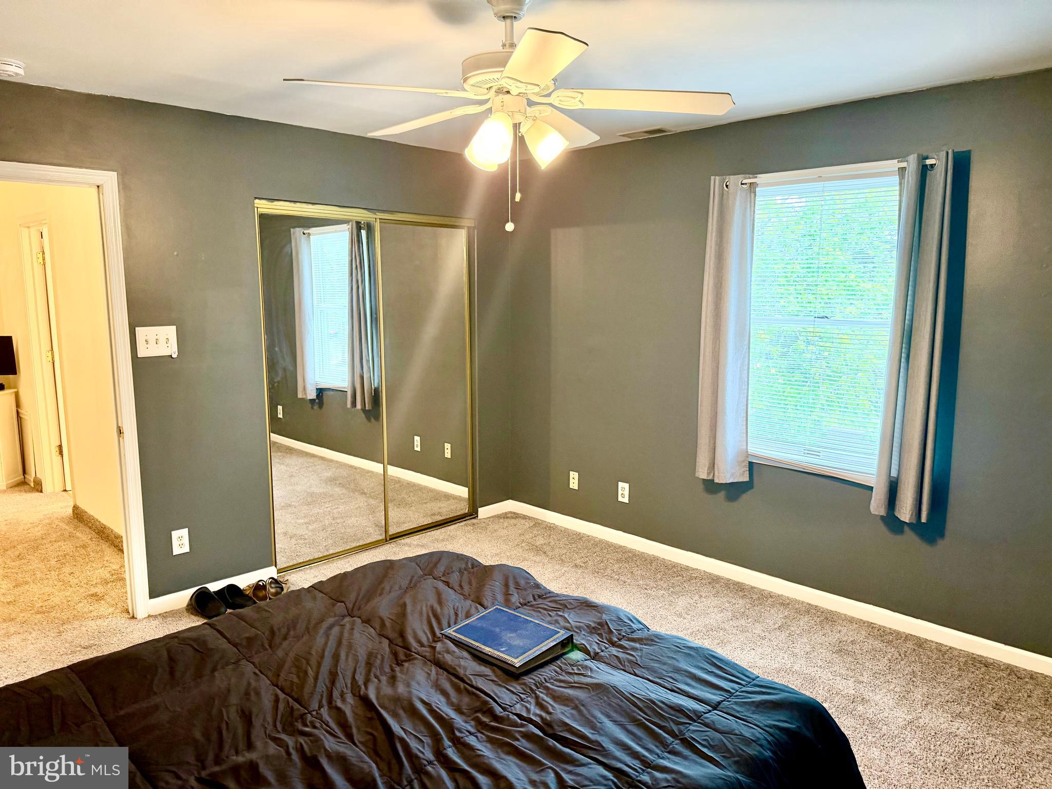 280 Progress Street Riverside, NJ 08075 - Photo 20 of 20 a bedroom with a bed and a chandelier