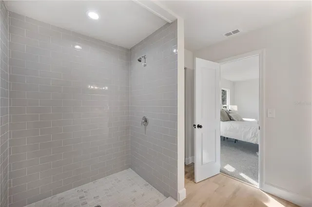 a view of an empty room with a window