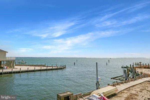 a view of ocean with boats