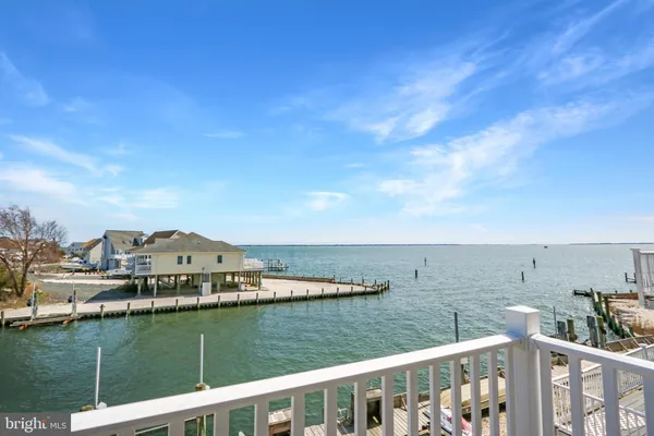 a view of a lake from a balcony