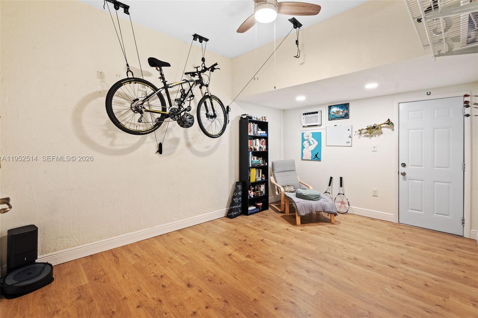 16634 Southwest 79th Terrace Miami, FL 33193 - Photo 22 of 25 a view of a room with gym equipment