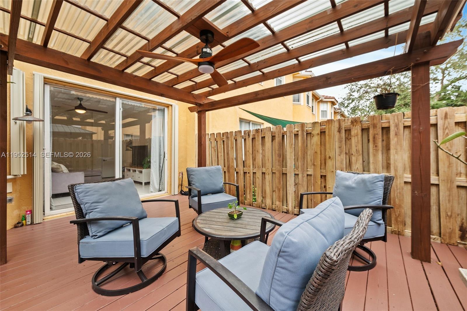 16634 Southwest 79th Terrace Miami, FL 33193 - Photo 24 of 25 a living room with furniture and wooden floor