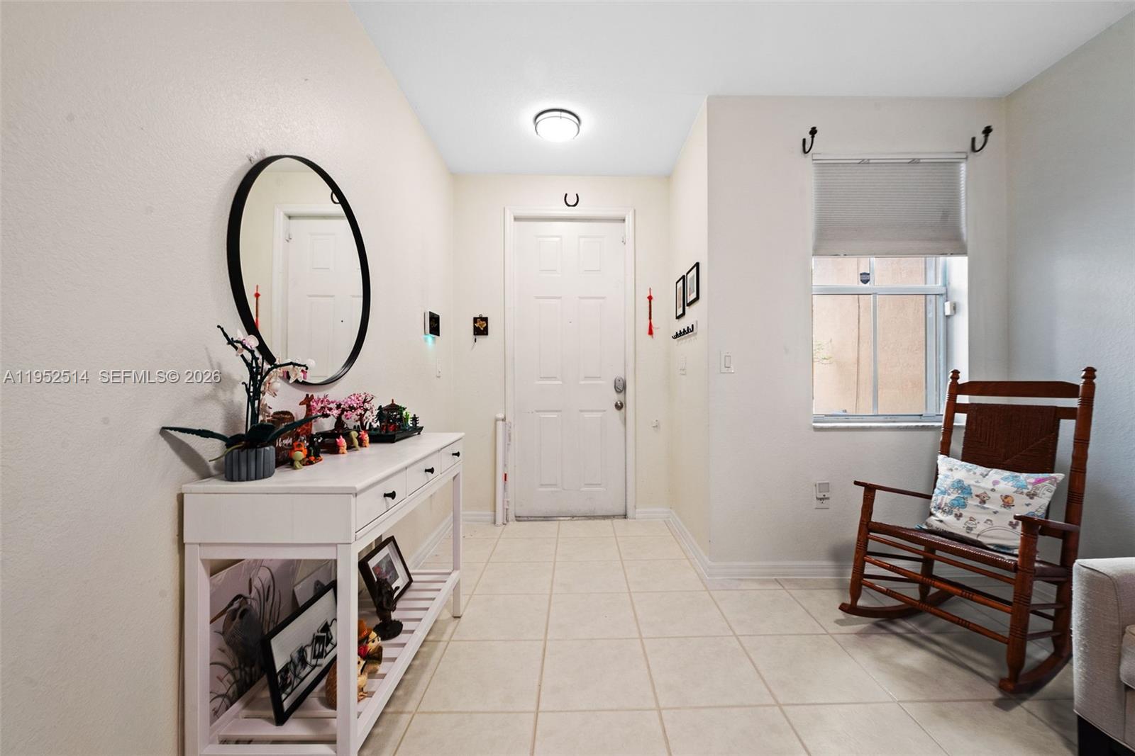 16634 Southwest 79th Terrace Miami, FL 33193 - Photo 3 of 25 a view of a hallway with washer and dryer