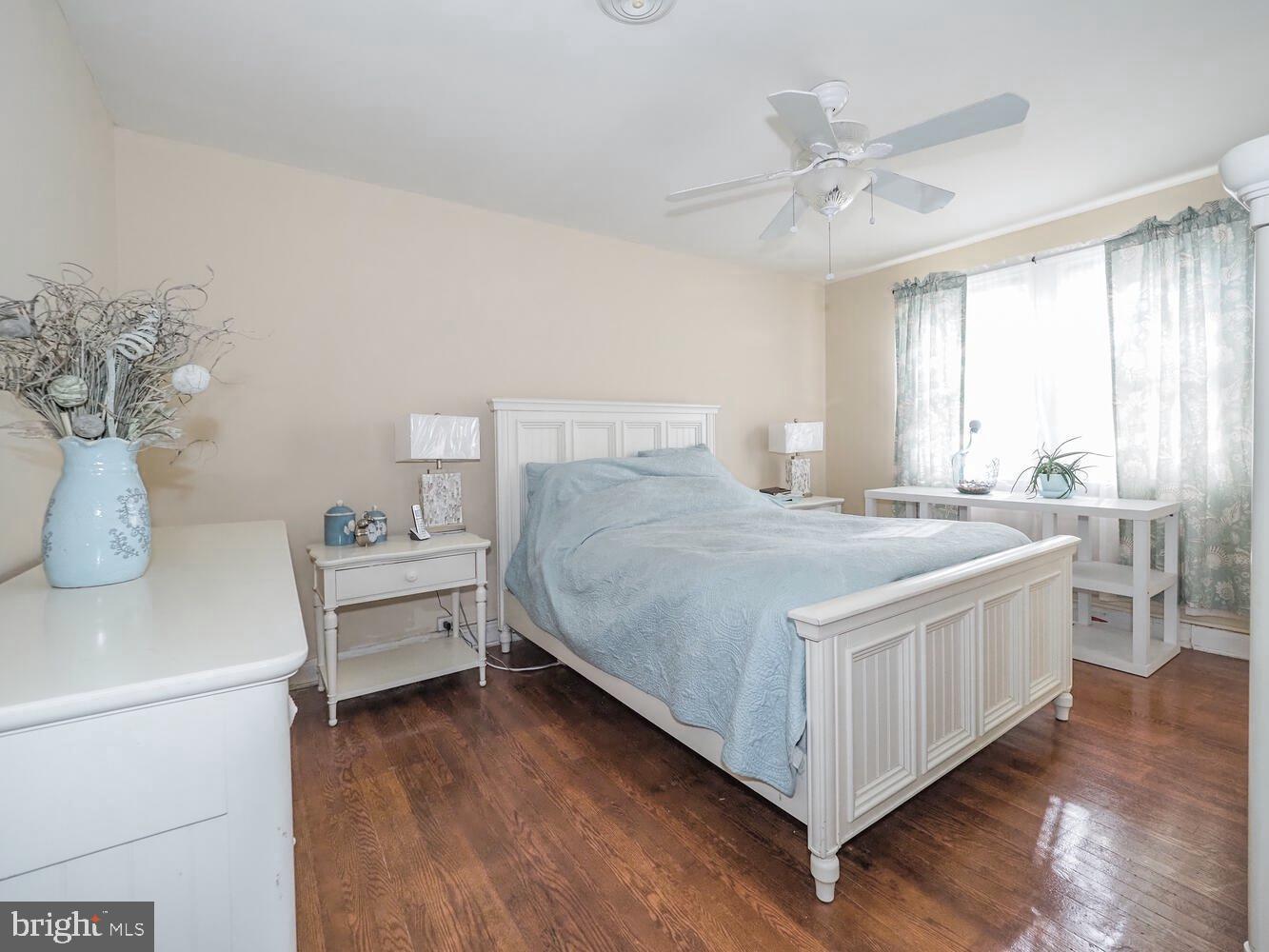 1540 Lochwood Road Baltimore, MD 21218 - Photo 18 of 46 a bedroom with a bed and window