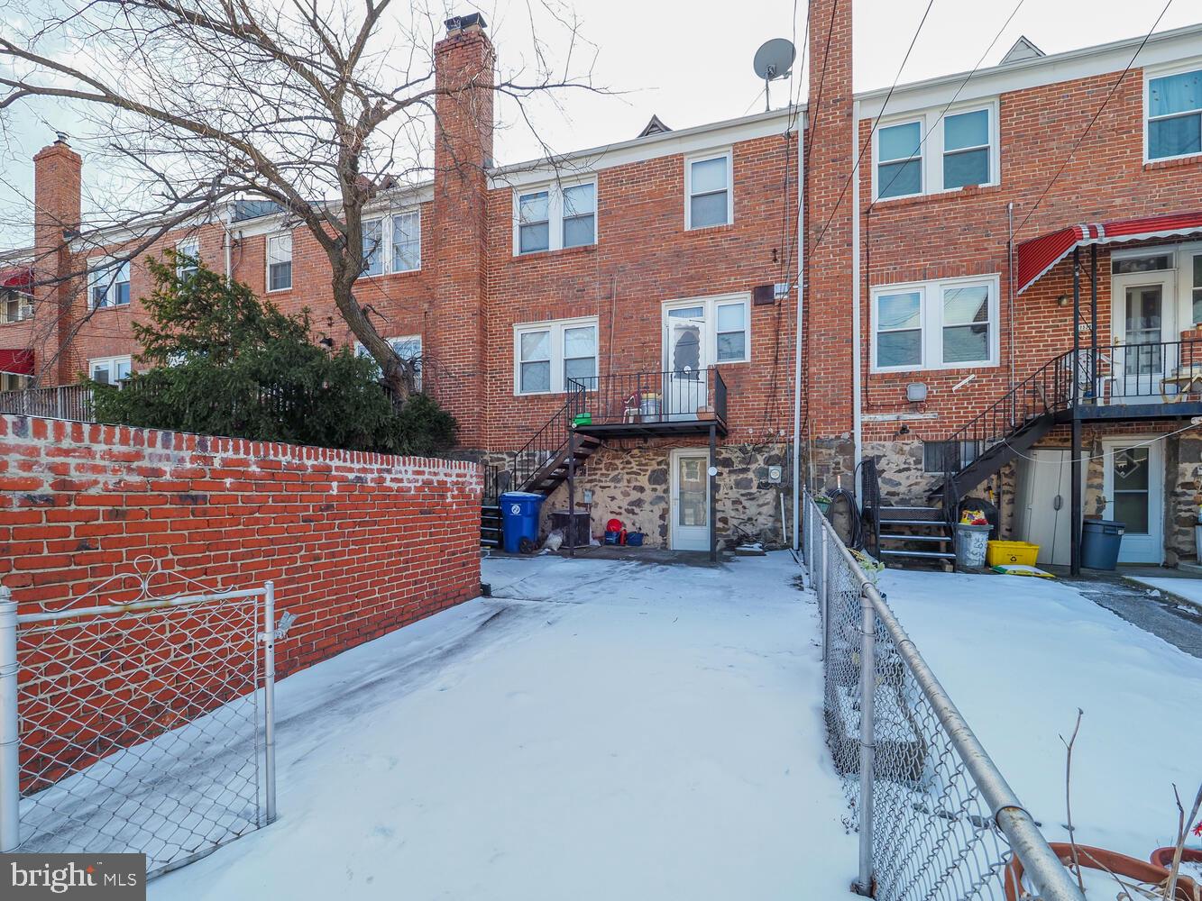 1540 Lochwood Road Baltimore, MD 21218 - Photo 37 of 46 a view of a brick building with many windows
