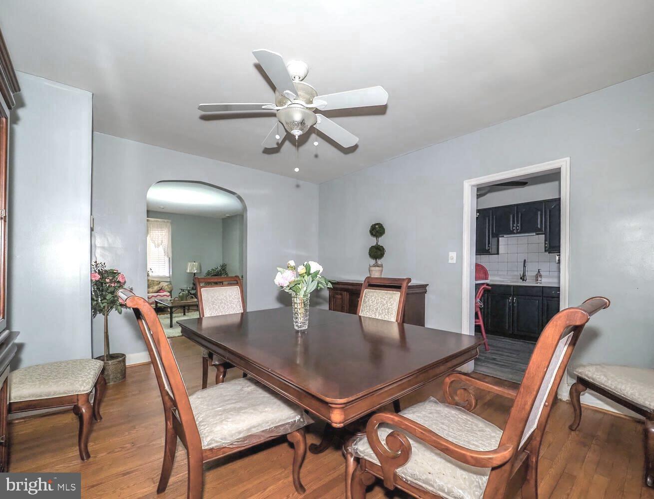 1540 Lochwood Road Baltimore, MD 21218 - Photo 10 of 46 a view of a dining room with furniture