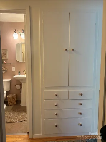 a view of a bathroom with a toilet