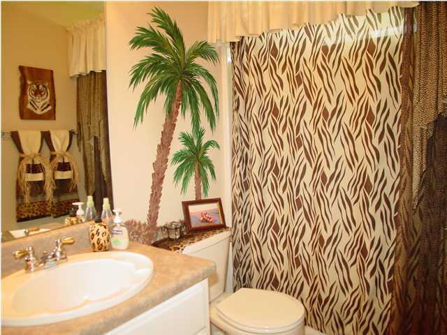 2549 Crescent Road Navarre, FL 32566 - Photo 18 of 22 a bathroom with a sink and a mirror