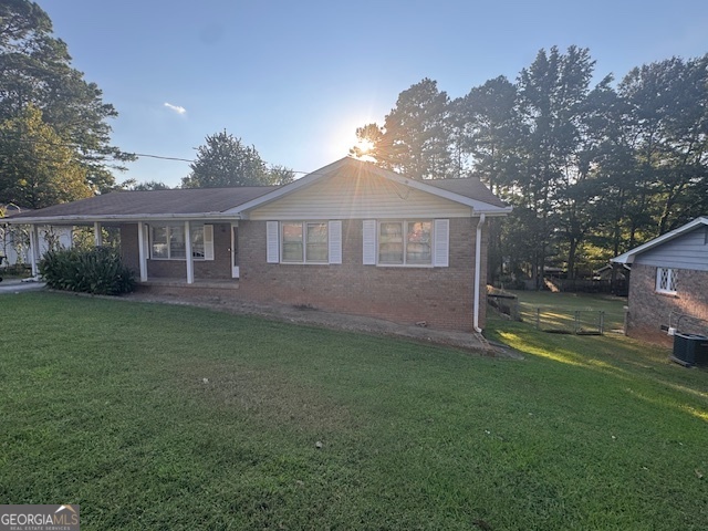 6057 Pinecreek Road Forest Park, GA 30297 - Photo 2 of 15 a view of a house with a yard