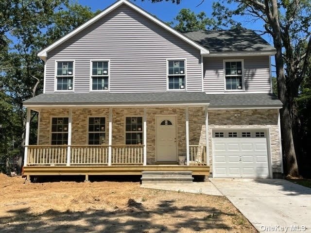 a view of a house with a door and wooden fence